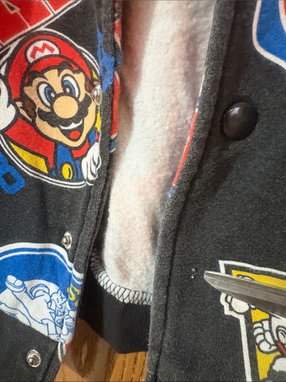 Super Mario Kids Black Graphic Bomber Jacket - one button missing - Picture 3 of 6